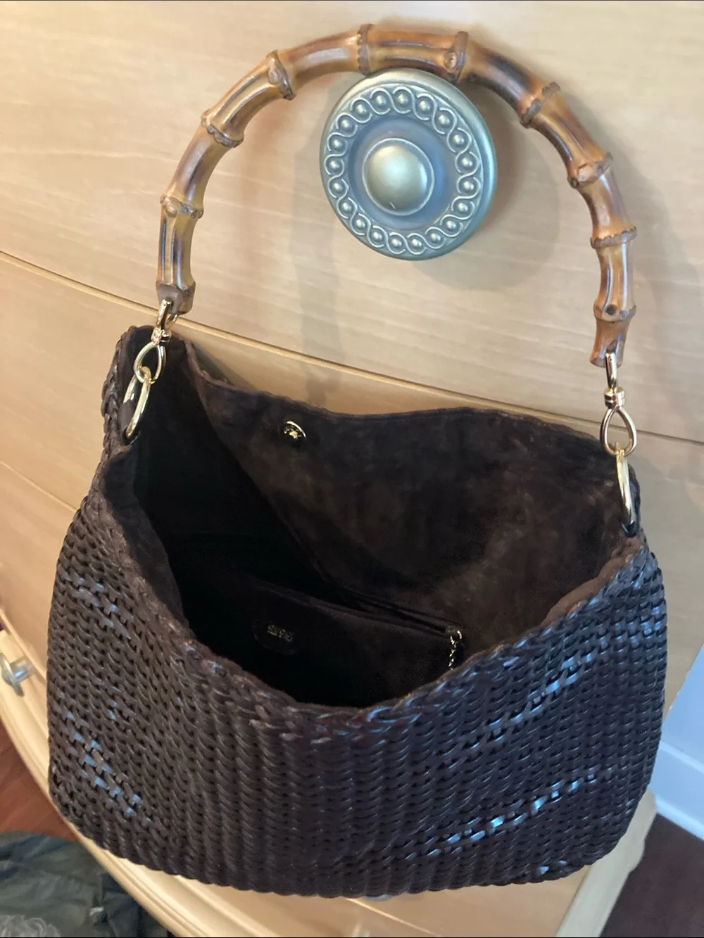 Brown leather/Suede interiorHandbag Interior with Zip Pocket. Dust bag included.
